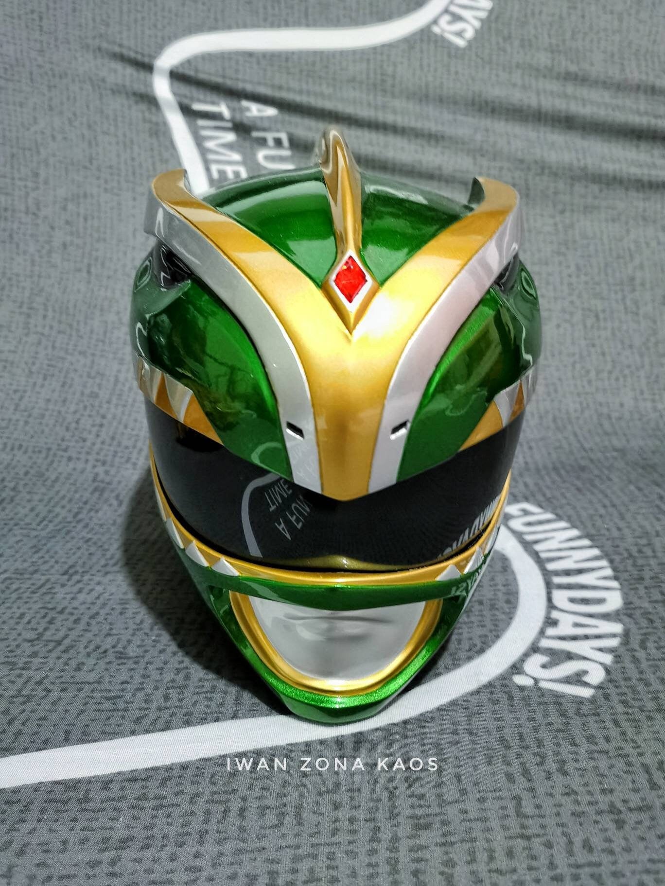 Green ranger bat in the sun helmet