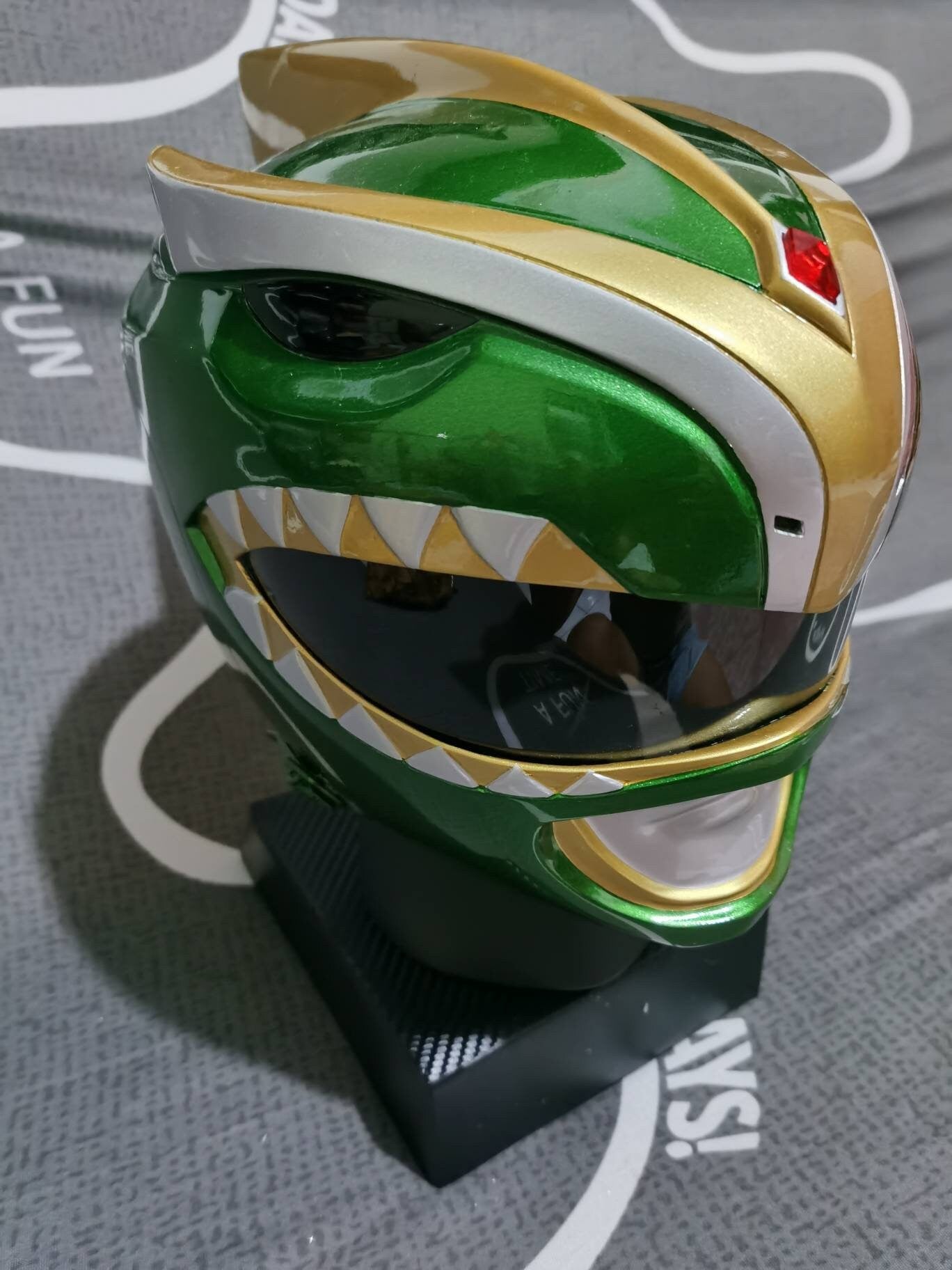 Green ranger bat in the sun helmet