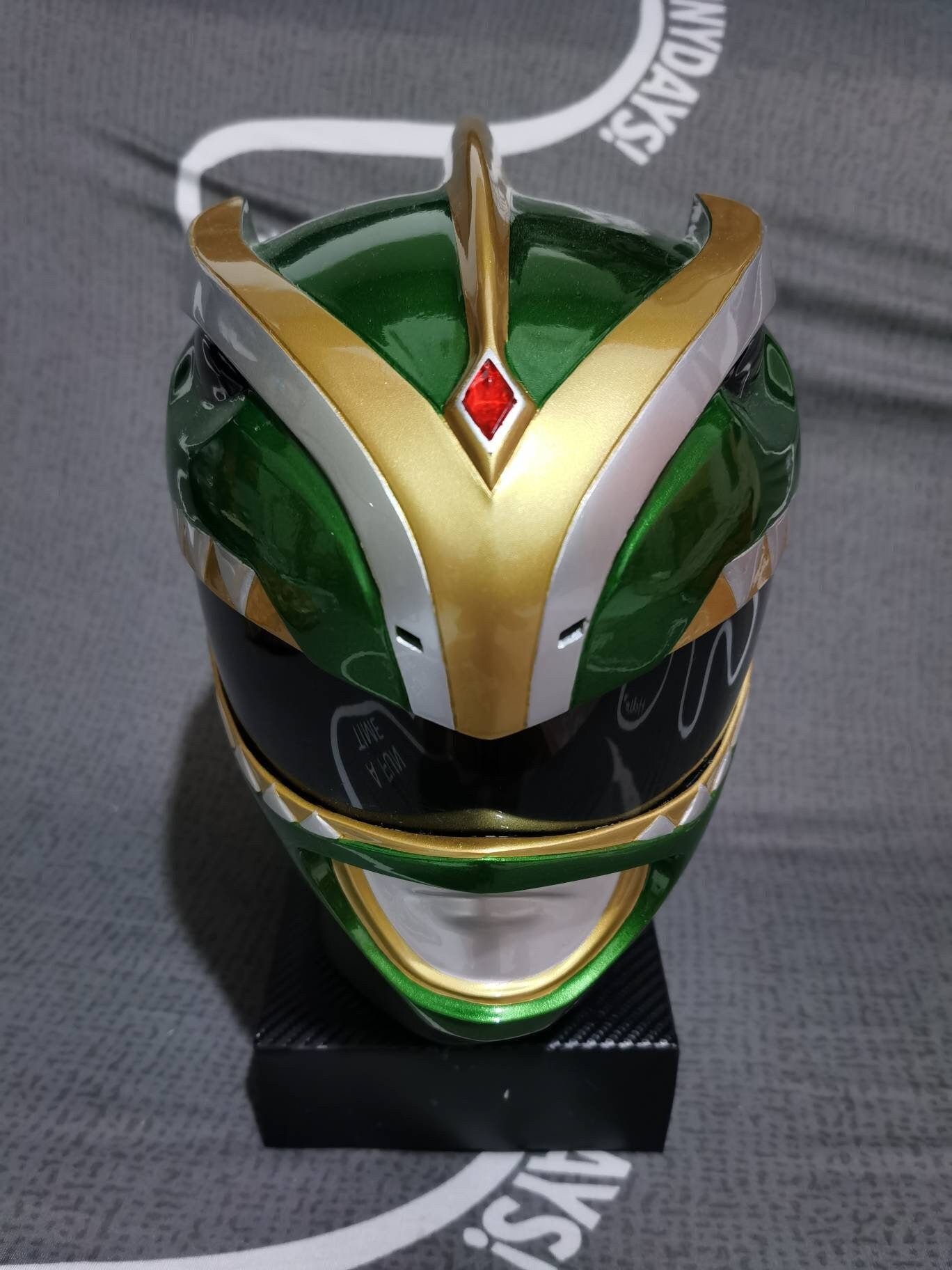 Green ranger bat in the sun helmet
