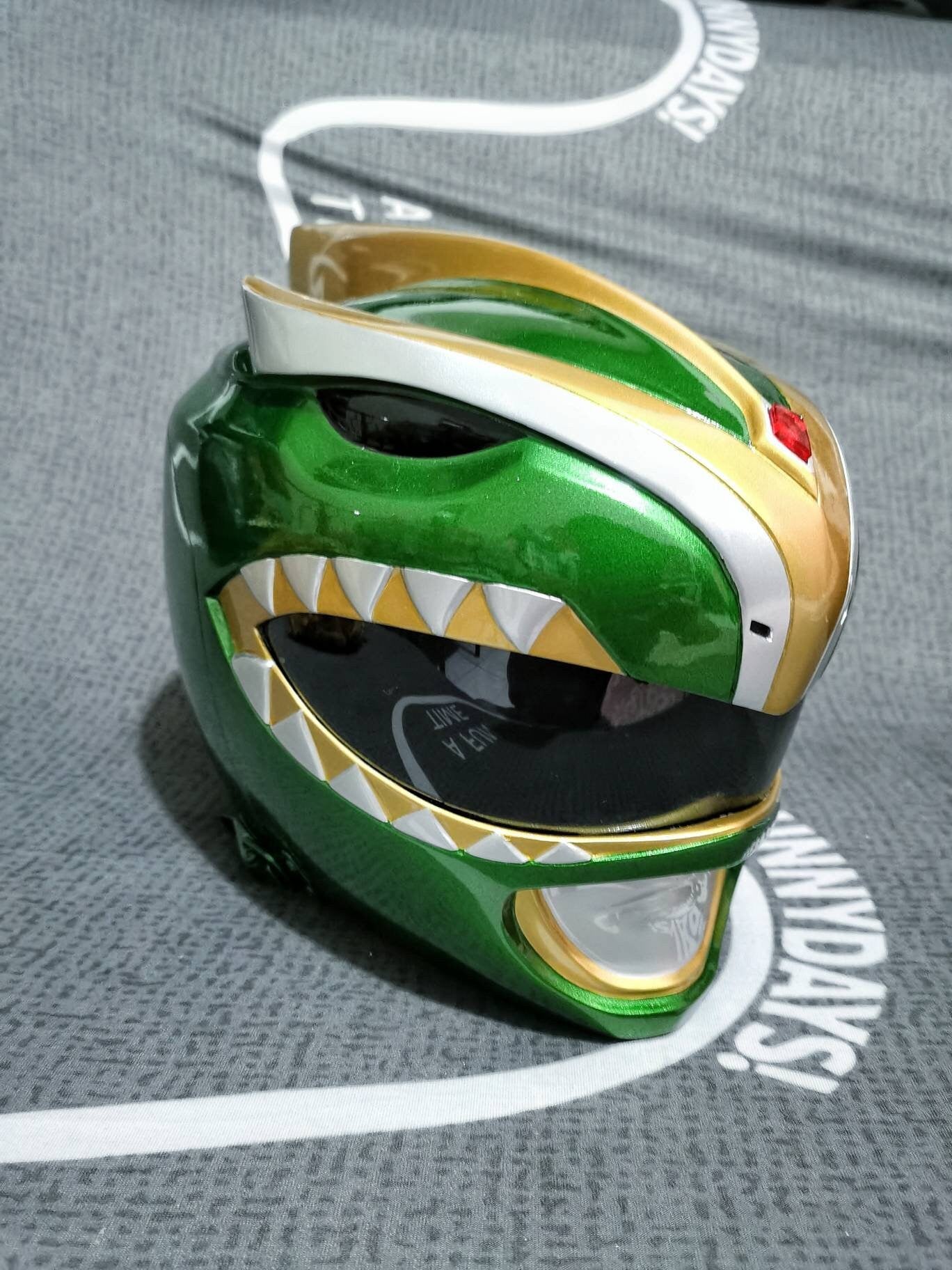 Green ranger bat in the sun helmet