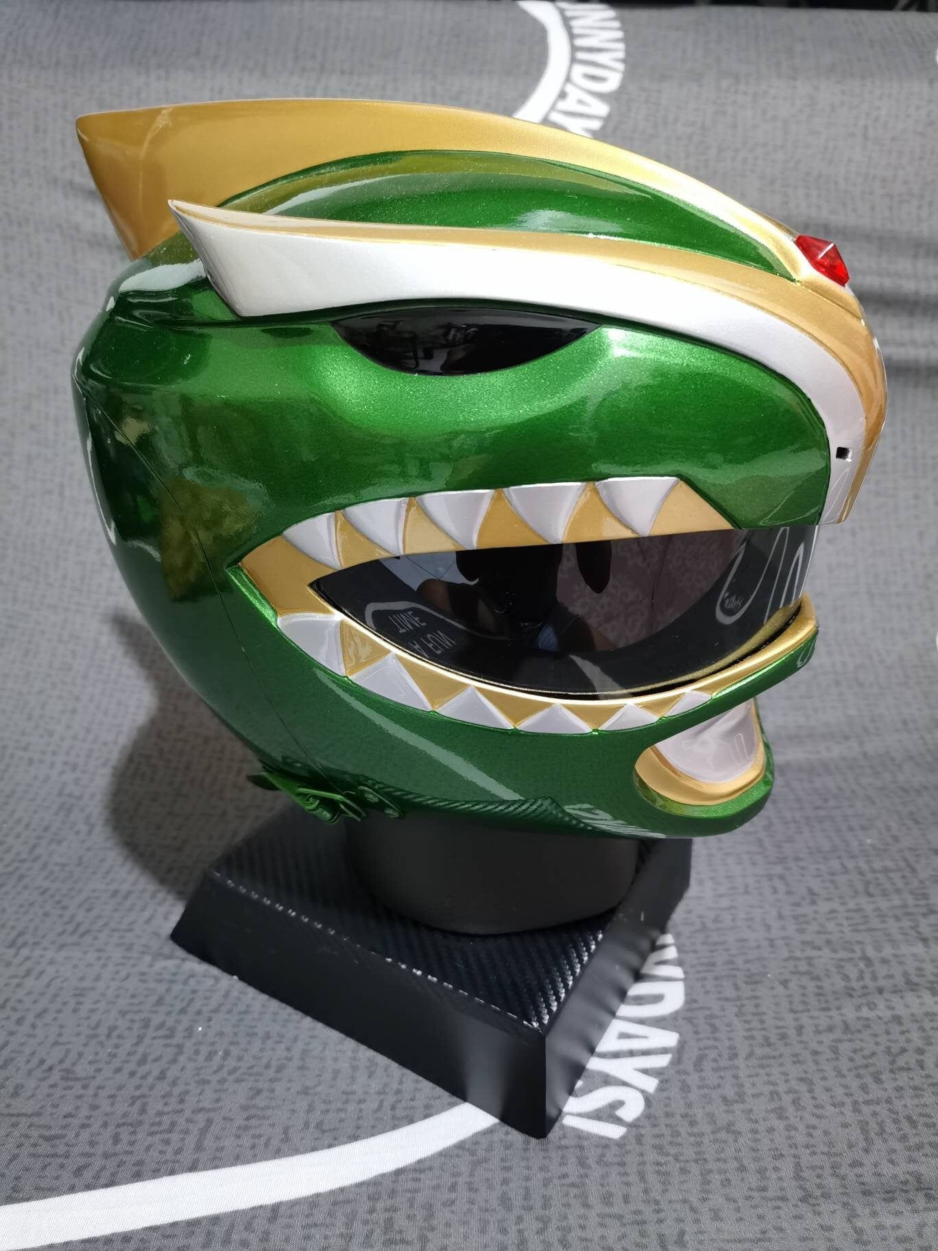 Green ranger bat in the sun helmet